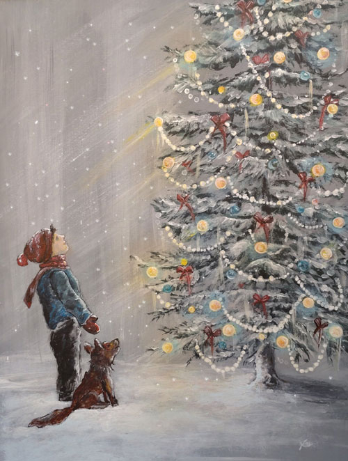 Junge vor Weihnachtsbaum